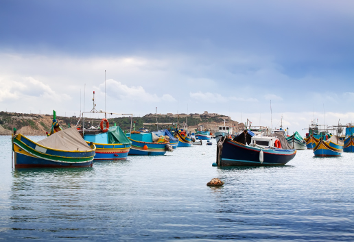 Essaouira old fishing port with boats and seagulls Essaouira old fishing port with boats and seagulls